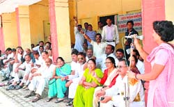 Members of the Congress hold a protest at the City Magistrates office in Haridwar on Saturday. 