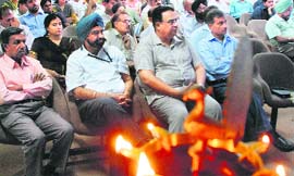 (From right) Rajan T Joseph, director-general, C-DAC; JS Bhatia, executive director, C-DAC Mohali; Sarvesh Kaushal, Punjab IT Principal Secretary; and Anil Wali, MD, Foundation for Innovation and Technology, IIT Delhi, at the C-DAC seminar in Mohali on Sunday.