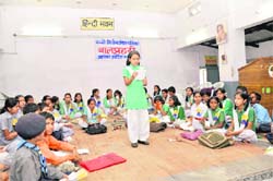 A girl participates at the concluding function of a writing workshop in Dehradun on Sunday.