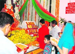 Devotees at the Shirdi Sai Baba Temple at Kulri Bazar in Mussoorie on Sunday.