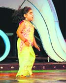 A child artiste performing during a reality dance show on Zee Telugu television channel. 
