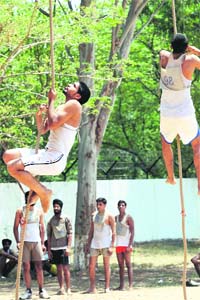 Candidates appear in a physical test for the post of fireman in the UT Fire and Emergency Services Department, at the Sector 26 Police Lines in Chandigarh.