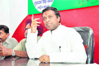 Vinod Barthwal, President of the Samajwadi Party, addresses a press conference in Dehradun