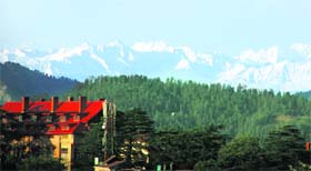 A view of Himalayan ranges covered with snow, as seen from Shimla, on Sunday.