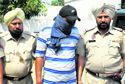 One of the accused in police custody