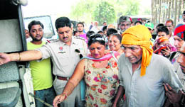 The man being taken by the police in Ludhiana on Monday