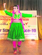 A participant showcases her talent in Super Star of Dance -2010 at GC-11