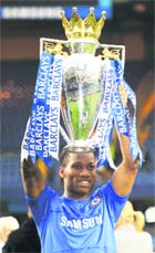 Chelseas Didier Drogba celebrates after winning the English Premier League at Stamford Bridge in London on Sunday.