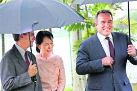 In this image made available by the US Embassy in Yangon, Myanmar's detained opposition leader Aung San Suu Kyi meets US Assistant Secretary of State Kurt Campbell (right) in Yangon, Myanmar