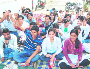  Students at the Rishikul Medical College protest in Haridwar on Tuesday.