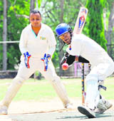   A batsman faces a delivery at the Second Babu Farid Ahmed Memorial Cricket Tournament in Dehradun on Tuesday.