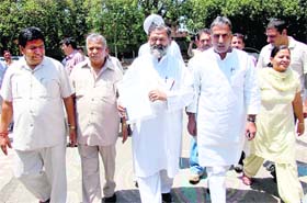 A BJP delegation comes out of Raj Bhawan after submitting a memorandum to Governor Jagannath Pahadia regarding the alleged NREGA scam in Ambala district, in Chandigarh