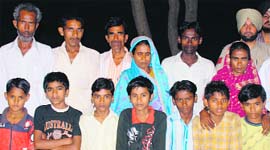 Rescued children with their parents in Ludhiana.