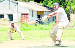 A batsman plays a cut shot in a match of the Second Babu Farid Ahmed Memorial Cricket Tournament in Dehradun on Wednesday