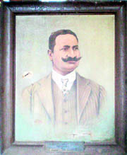 The portrait of Lala Mansumrat Dass before and (right) after restoration.