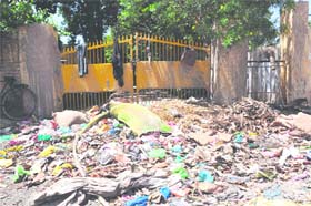 A heap of garbage dumped outside the Health Officers residence in Haridwar