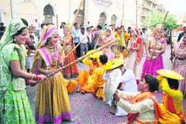 Artistes from Mathura perform during the Bhagwan Parshuram Jayanti celebrations in Jammu on Wednesday; 