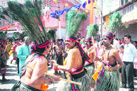 Artistes from Andhra Pradesh perform during a procession.