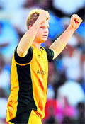 Australias Steven Smith celebrates a wicket on Tuesday