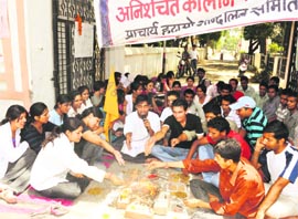Students conduct a hawan at Rishikul College in Haridwar on Thursday.