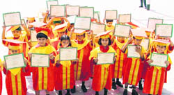 Tiny tots with their degrees at Green Land Senior Secondary School, Jalandhar bypass.