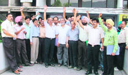 Lawyers protest outside the sales tax department in Ludhiana 