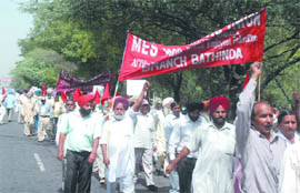 Members of the MES Workers Union carrying out a protest march in support of their demands in Bathinda