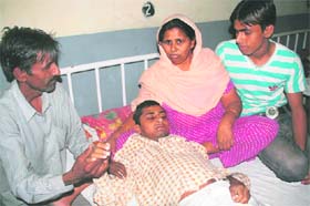 Karans family members with him at the GMCH in Jammu