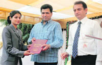A student receiving the certificate