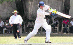 A batsman in action at the 28th All-India Uttarakhand Gold Cup Cricket Tournament in Dehradun on Saturday.