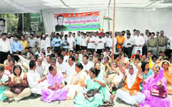 Members of Congress stage a dharna at the Gandhi Park in Dehradun 