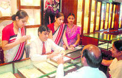 Customers at a jewellery shop on the eve of Akshaya Tritiya in Haridwar