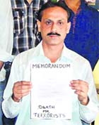 Mehar Banerjee, a teacher and president of Saarthi, an NGO, shows a copy of his memo.