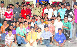 Students with DIG Farooq Khan before leaving Jammu on Saturday.