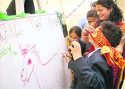 Students and parents enjoy themselves at the annual fete at Mussoorie Public School in Mussoorie on Saturday.