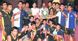 Boys of Pestle Weed School with the trophy of the District Sub-Junior Basketball Championship in Dehradun on Sunday.