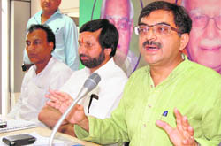 Tarun Vijay, BJP spokesperson, addresses a press conference in Dehradun on Sunday.