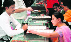 Residents purchase jewellery on Akshaya Tritya in Jammu on Sunday