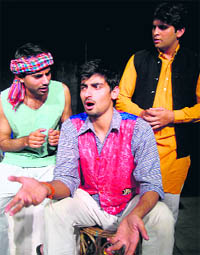 A scene from the play, Khandani Gawah ,directed by Balwant Thakur being performed at Natrangs Sunday Theatre in Jammu on Sunday