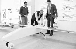 Manjeev Bhogal (centre), managing partner of Bhogal Cycles Ltd, with his UAV in Ludhiana. 