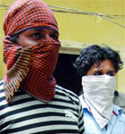 The accused in police custody in New Delhi on Monday.