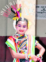 Another one, from Orissa, waits for her turn at the eighth National Theatre and Folk Dance festival in Dehradun on Monday
