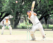 A batsman plays a shot during a match at the Kanta Devi Raghav Memorial National Cricket Tournament on Dehradun on Monday