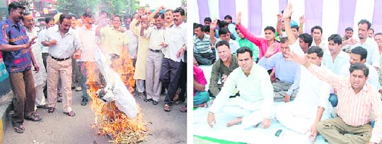 BJP workers burn an effigy of the Central government and (right) the BJP Yuva Morcha holds a protest in Dehradun on Monday. 