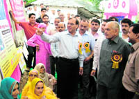 Education Minister ID Dhiman and MP Anurag Thakur inspecting an exhibition at a health camp at Bhareri on Monday