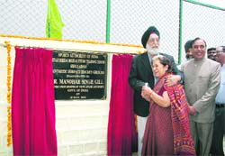 Union Minister for Youth Affairs and Sports MS Gill with Indian Womens Hockey president Vidya Stokes at the inauguration of the countrys high-altitude Astroturf at Shilaru, about 65 km from Shimla on Tuesday. 