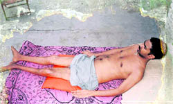 Pawan Kumar lying flat for the past 18 years owing to a disablity