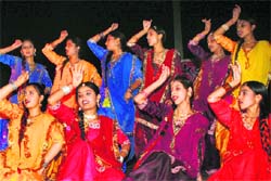 Students give a performance during an inter-dance competition in Jammu on Tuesday