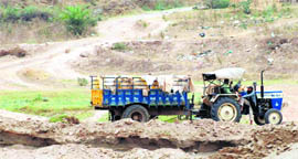 Illegal mining goes on in the Ghaggar river belt behind Chhatbir Zoo in Banur.