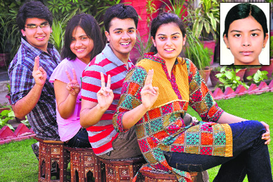 CBSE class XII toppers (from left) Dashank Arora (96.2 pc; non-medical) of DAV, Sector 8; Saloni Singh (95 pc; arts) of DAV, Panchkula; Tushar Dogra (96.2 pc; non-medical) of SD School, Sector 32; and Garima Kaushal (96.4 pc; commerce) of Carmel Convent, Sector 9, flash victory signs in Chandigarh on Wednesday. (Inset) Anam Sidiqui (96 pc; medical) of KV-47.